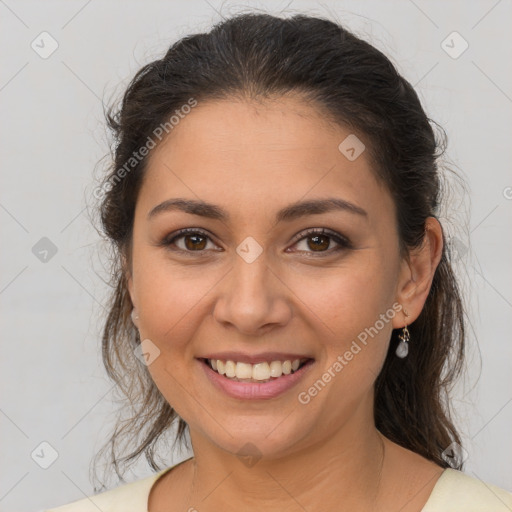 Joyful latino young-adult female with medium  brown hair and brown eyes