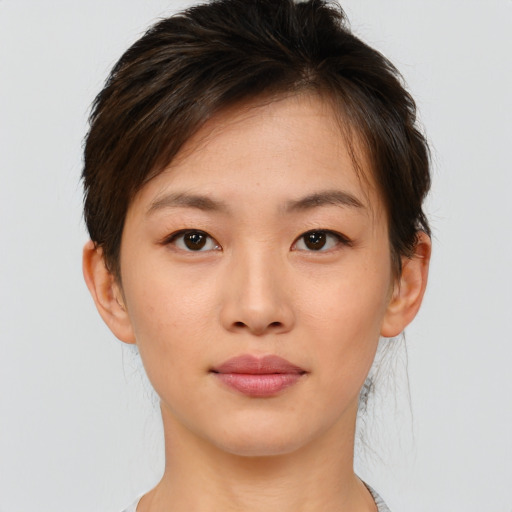 Neutral white young-adult female with short  brown hair and brown eyes