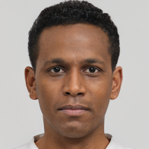 Neutral black young-adult male with short  brown hair and brown eyes
