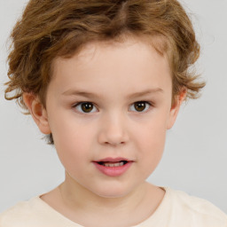 Joyful white child male with short  brown hair and brown eyes