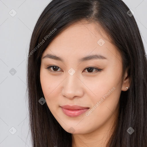 Joyful asian young-adult female with long  brown hair and brown eyes