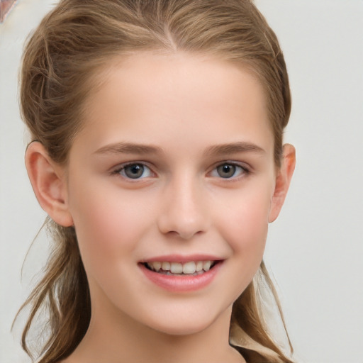 Joyful white child female with long  brown hair and brown eyes