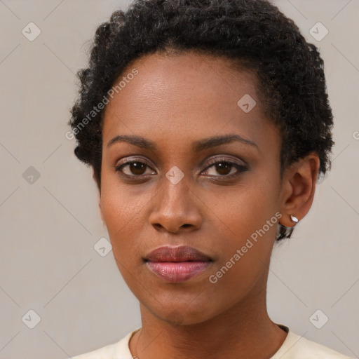 Neutral black young-adult female with short  brown hair and brown eyes