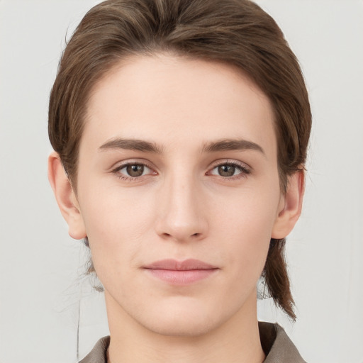 Neutral white young-adult female with short  brown hair and grey eyes