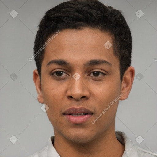 Joyful latino young-adult male with short  brown hair and brown eyes