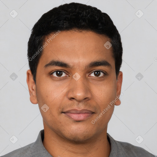 Joyful latino young-adult male with short  black hair and brown eyes