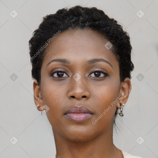 Neutral black young-adult female with short  brown hair and brown eyes