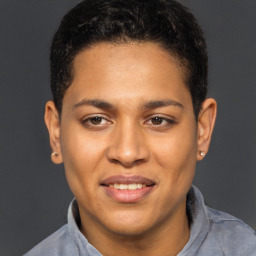 Joyful latino young-adult male with short  brown hair and brown eyes