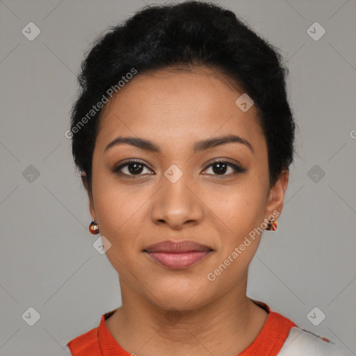 Joyful latino young-adult female with short  black hair and brown eyes