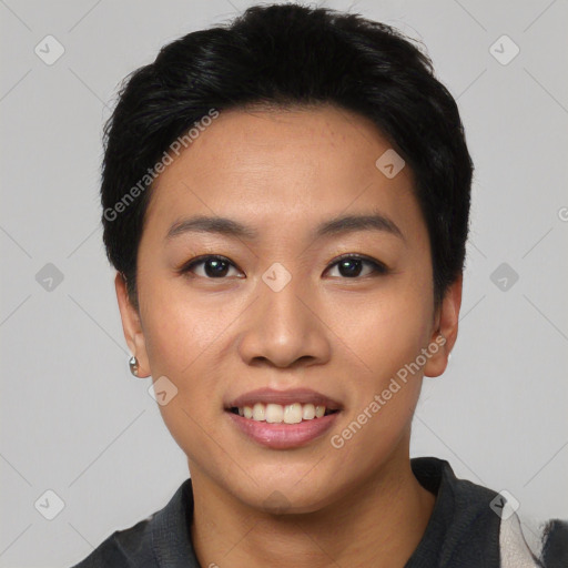 Joyful asian young-adult female with short  black hair and brown eyes