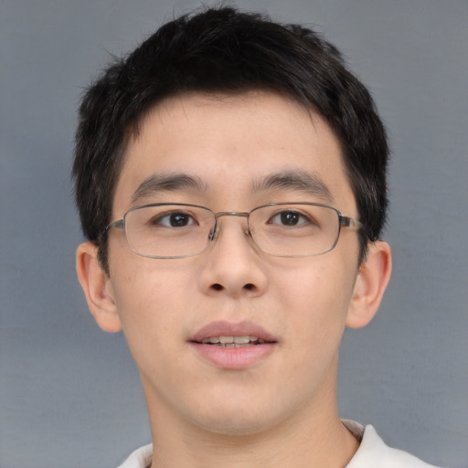 Neutral asian young-adult male with short  brown hair and brown eyes