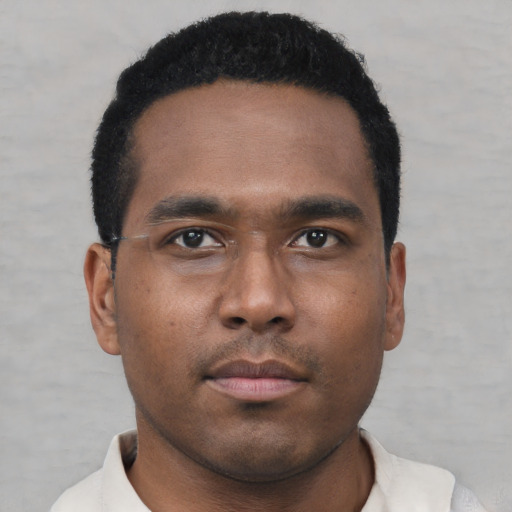 Neutral black young-adult male with short  brown hair and brown eyes