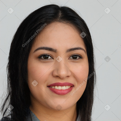 Joyful latino young-adult female with long  brown hair and brown eyes