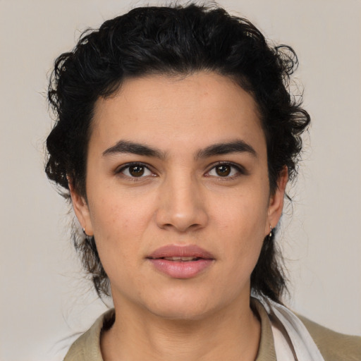 Neutral latino young-adult female with medium  black hair and brown eyes