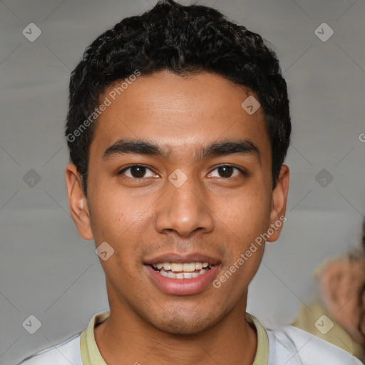 Joyful latino young-adult male with short  black hair and brown eyes