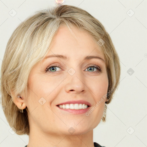 Joyful white adult female with medium  brown hair and blue eyes