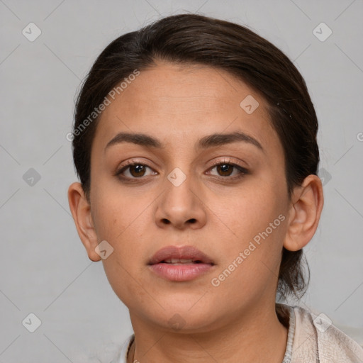 Neutral white young-adult female with short  brown hair and brown eyes