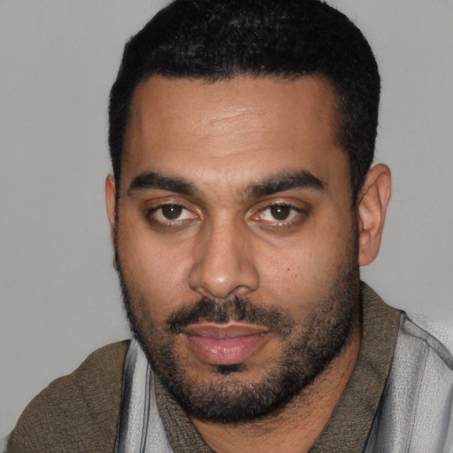 Neutral black young-adult male with short  black hair and brown eyes