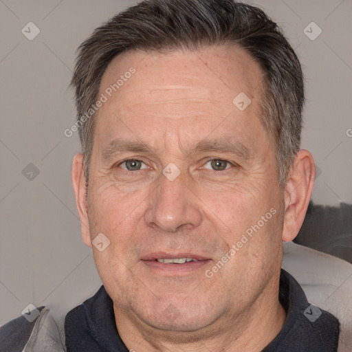 Joyful white middle-aged male with short  brown hair and brown eyes