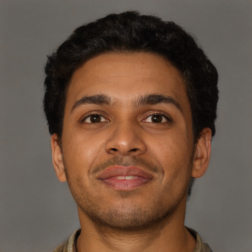 Neutral black young-adult male with short  brown hair and brown eyes