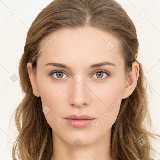 Neutral white young-adult female with long  brown hair and brown eyes