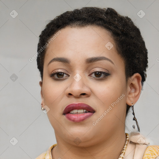 Joyful latino young-adult female with short  brown hair and brown eyes