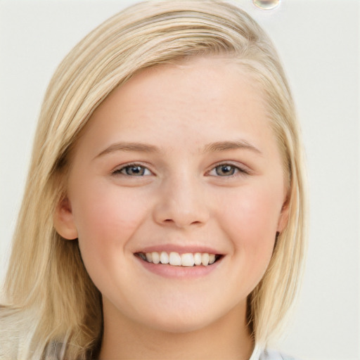 Joyful white young-adult female with long  brown hair and blue eyes