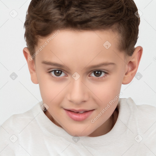 Joyful white child male with short  brown hair and brown eyes