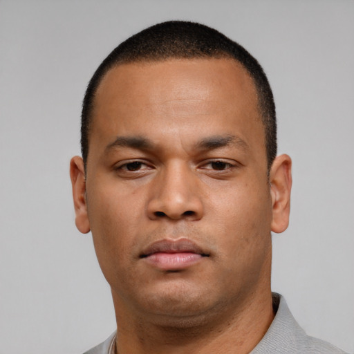Neutral black young-adult male with short  brown hair and brown eyes
