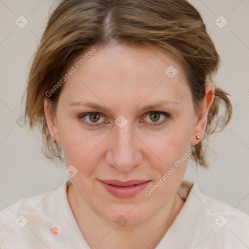 Joyful white adult female with medium  brown hair and blue eyes