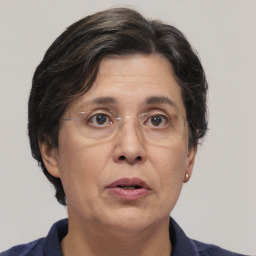 Neutral white adult female with short  brown hair and brown eyes