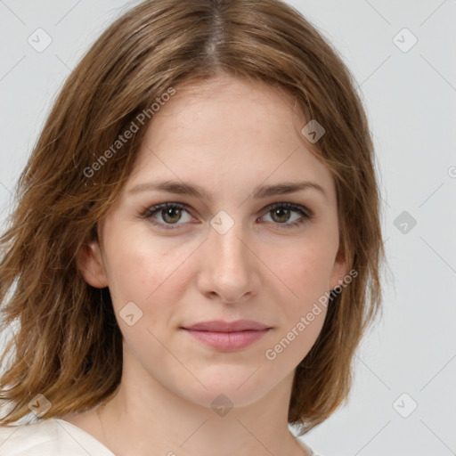 Joyful white young-adult female with medium  brown hair and green eyes