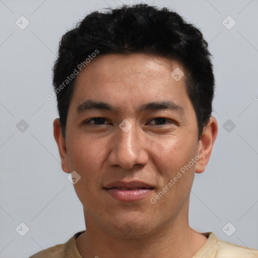 Joyful asian young-adult male with short  black hair and brown eyes