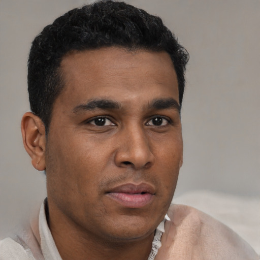 Neutral black young-adult male with short  brown hair and brown eyes