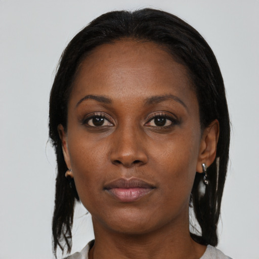 Neutral black adult female with medium  black hair and brown eyes