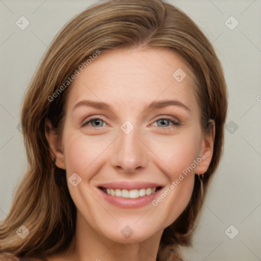 Joyful white young-adult female with long  brown hair and blue eyes