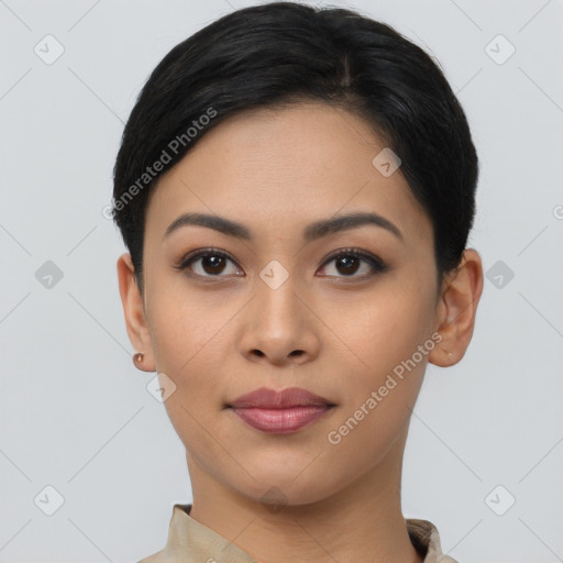 Joyful asian young-adult female with short  black hair and brown eyes