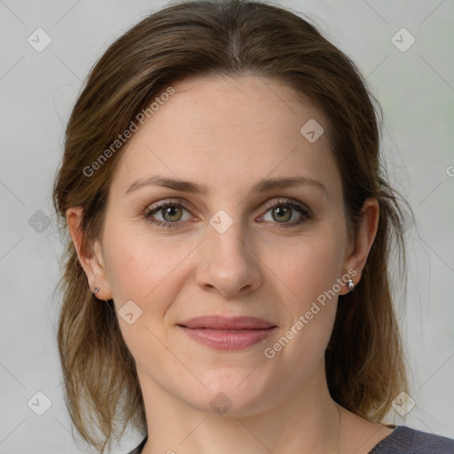 Joyful white young-adult female with medium  brown hair and green eyes