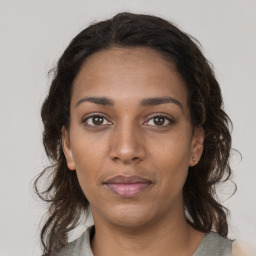 Neutral black young-adult female with medium  brown hair and brown eyes