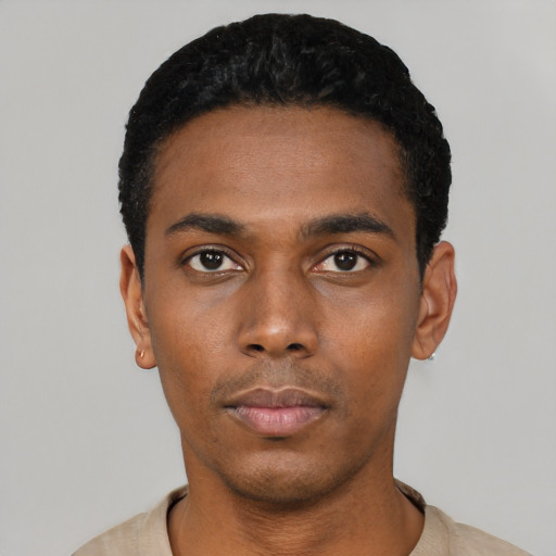Neutral black young-adult male with short  black hair and brown eyes