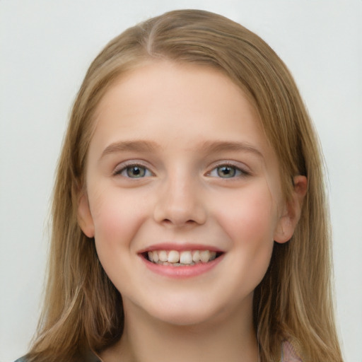 Joyful white child female with long  brown hair and blue eyes