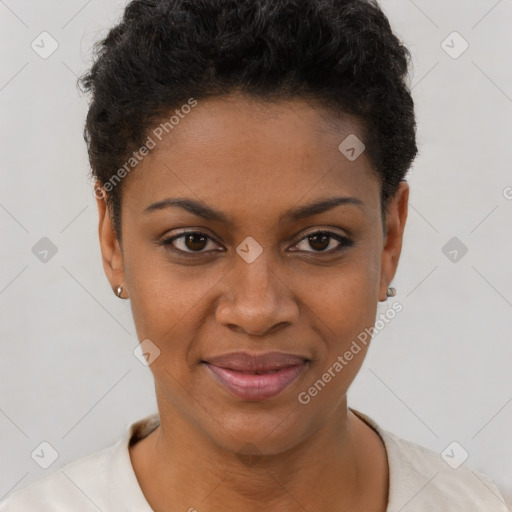 Joyful black young-adult female with short  black hair and brown eyes