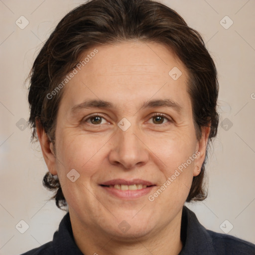 Joyful white adult female with medium  brown hair and brown eyes