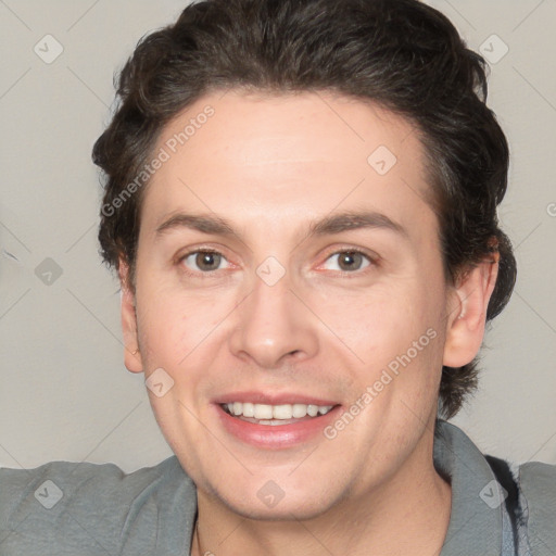 Joyful white young-adult male with medium  brown hair and brown eyes