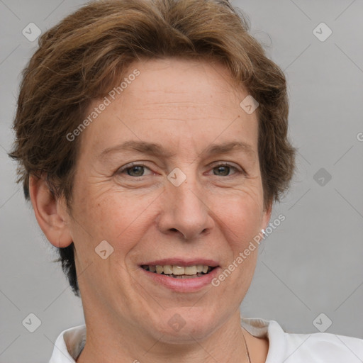 Joyful white adult female with short  brown hair and brown eyes