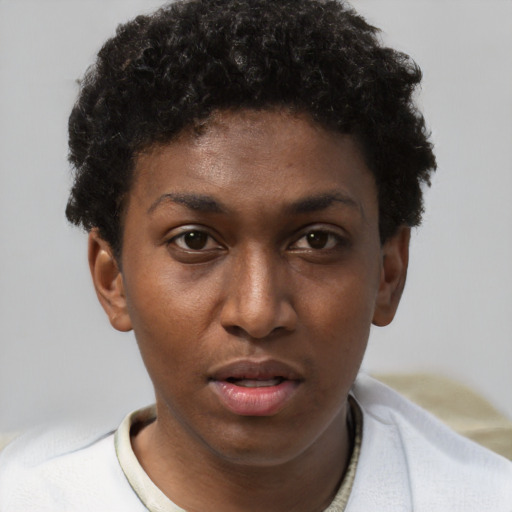 Neutral black young-adult female with short  brown hair and brown eyes