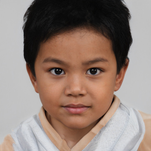 Joyful white child female with short  brown hair and brown eyes