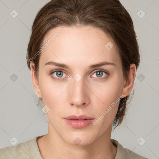 Neutral white young-adult female with medium  brown hair and grey eyes