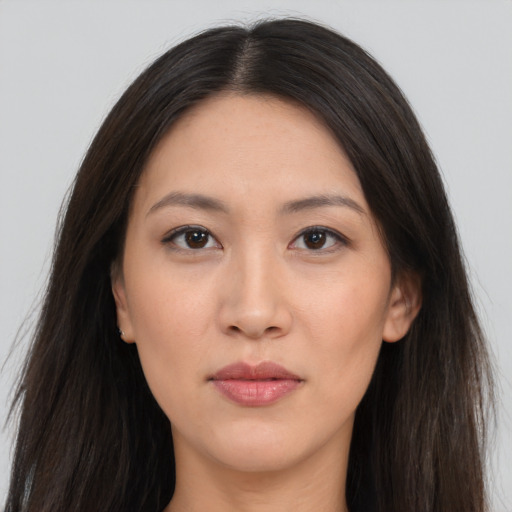 Neutral asian young-adult female with long  brown hair and brown eyes