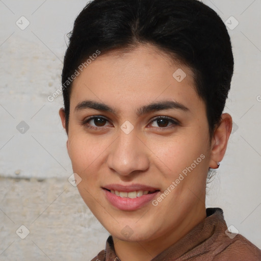 Joyful white young-adult female with short  brown hair and brown eyes